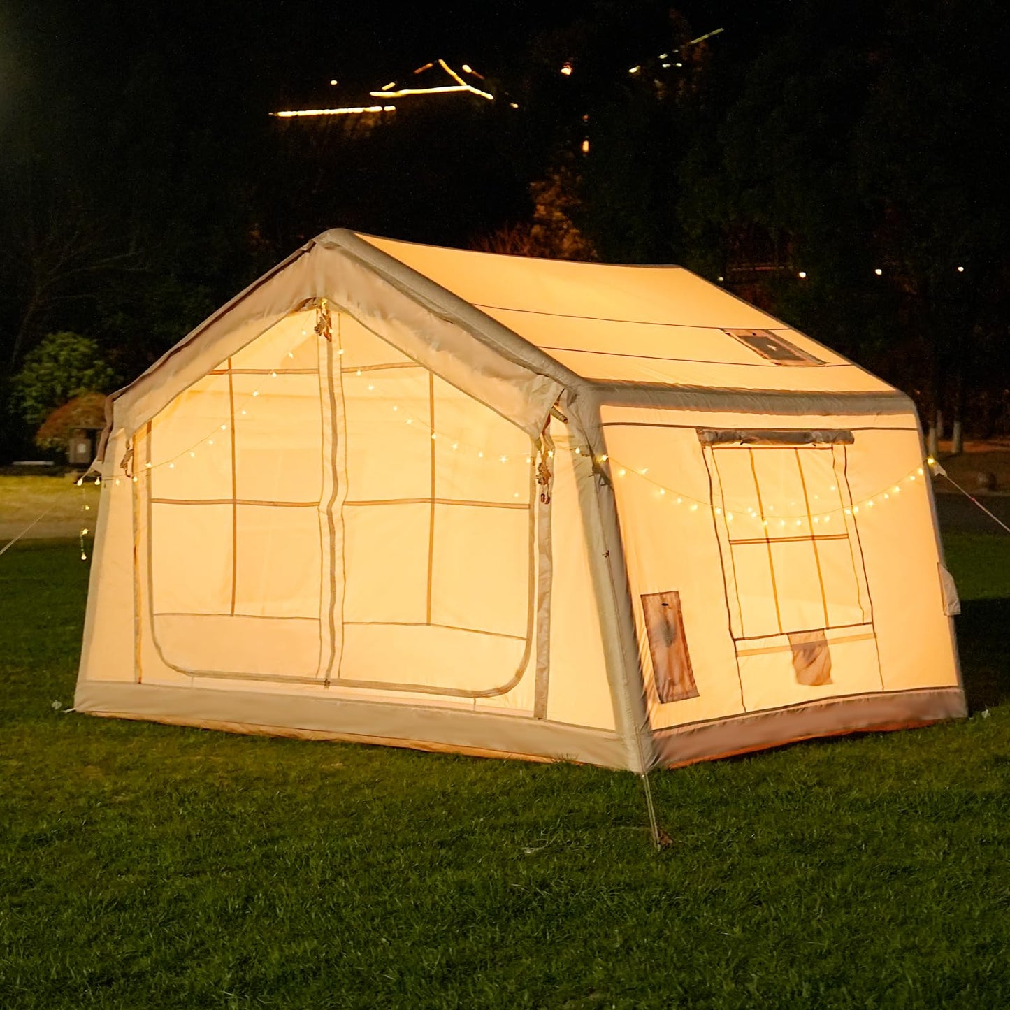 Inflatable camping tent with manual air pump