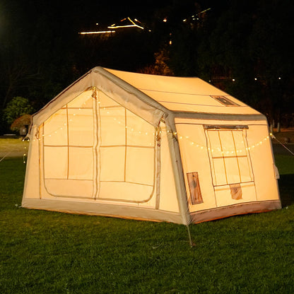 Inflatable camping tent with manual air pump